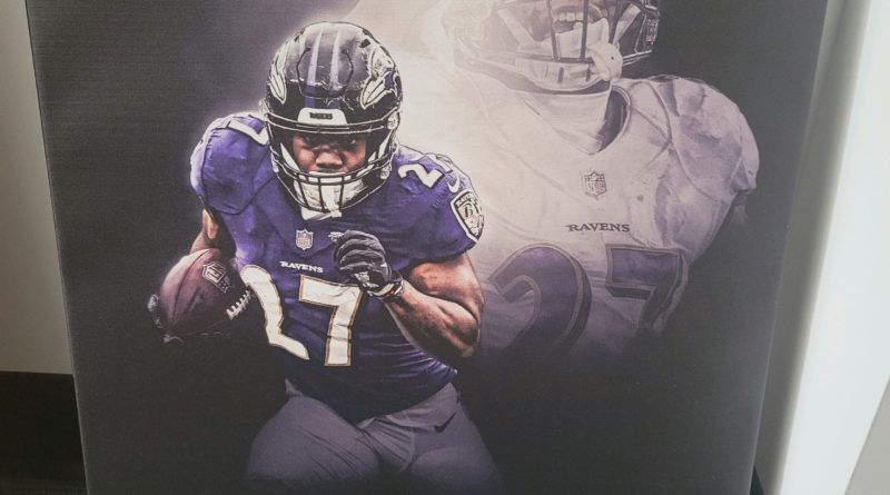 J.K. Dobbins autographed canvas